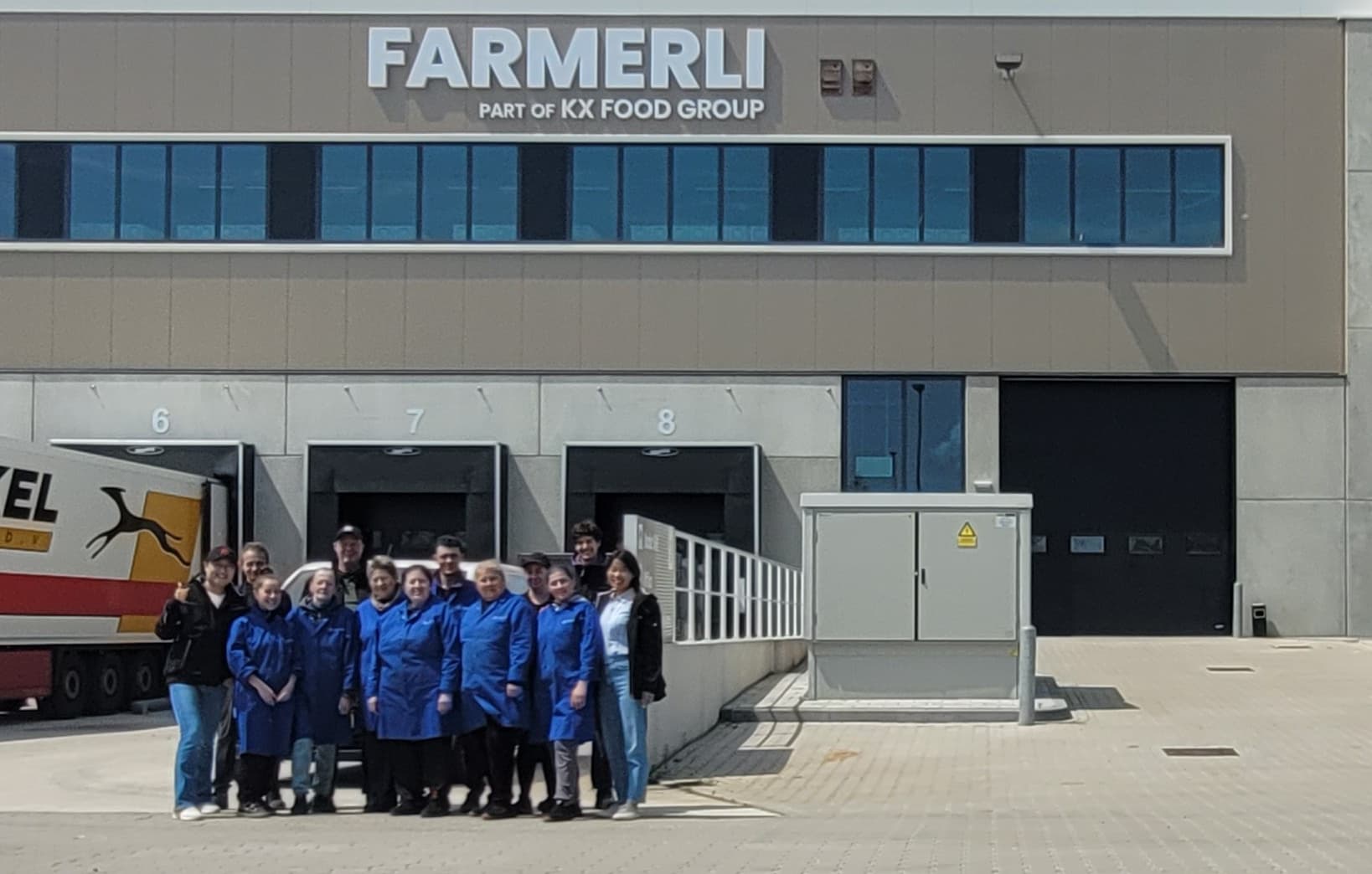 The KX Food team outside the Farmerli loading docks